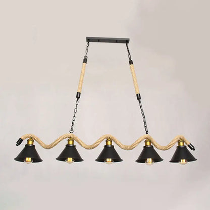 Decorbites industrial metal conical island ceiling light with five black metal shades, brass accents, and hemp rope suspension