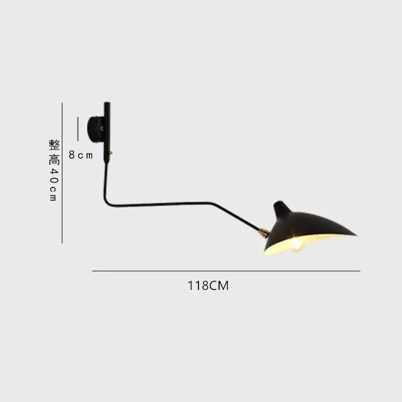 Black matte wall-mounted reading lamp with curved arm and conical shade complements decorbites black serge floor lamp