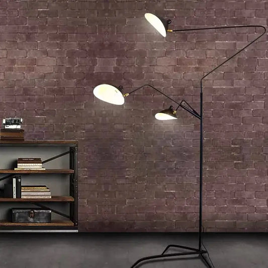 Industrial black metal floor lamp with three adjustable white dome lights ideal for living room decorbites black serge