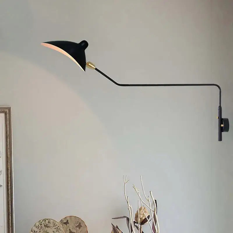 Industrial black metal floor lamp with three lights and decorbites black serge curved wall-mounted lamp arm