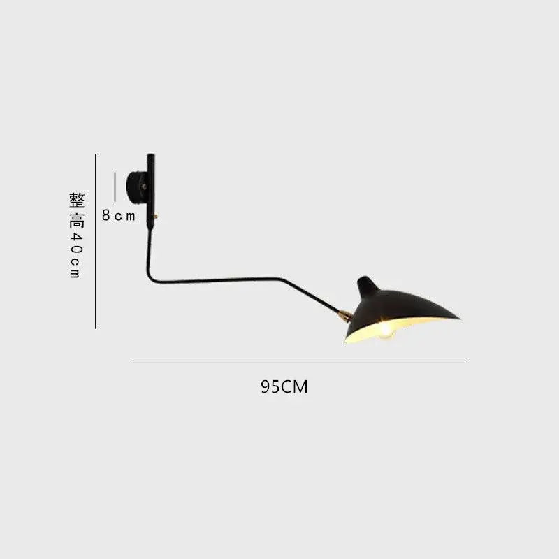 Black serge mouille wall-mounted lamp with curved arm and conical shade complements decorbites black serge floor lamp