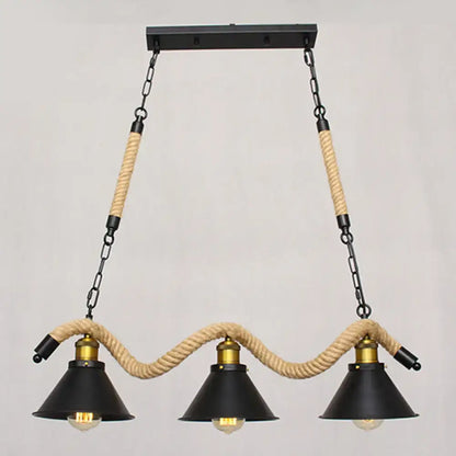 Industrial black metal island chandelier with three conical shades brass fixtures and natural rope-wrapped chains