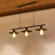 Industrial black metal island lamp chandelier with three exposed edison bulbs and matching circular shades for dining room