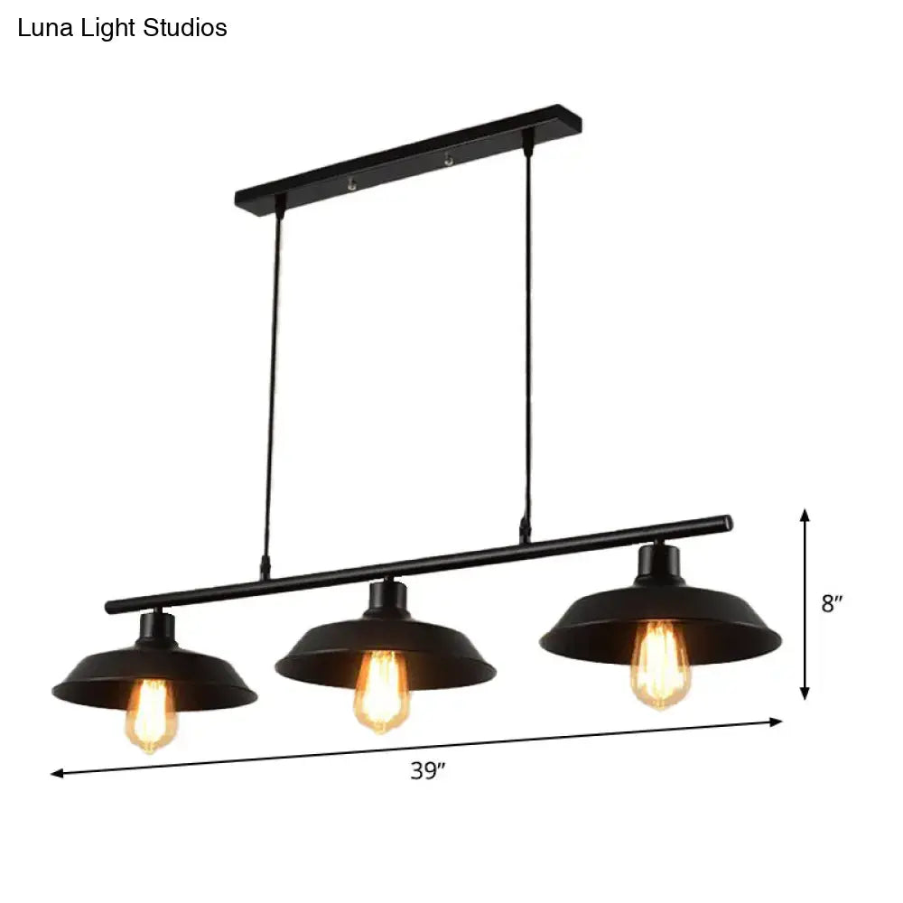 Black industrial-style metal island lamp with three exposed filament led incandescent bulbs for dining room use