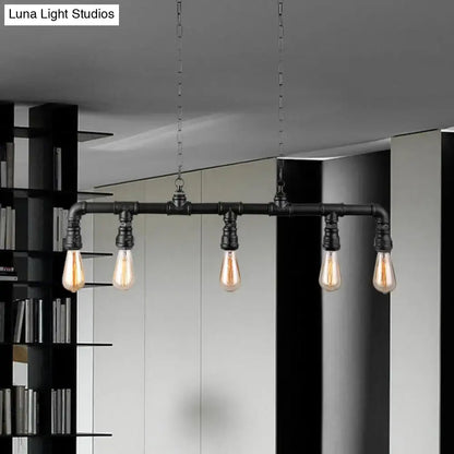 Industrial-style black metal island pendant light with four exposed filament bulbs and five pipes by decorbites