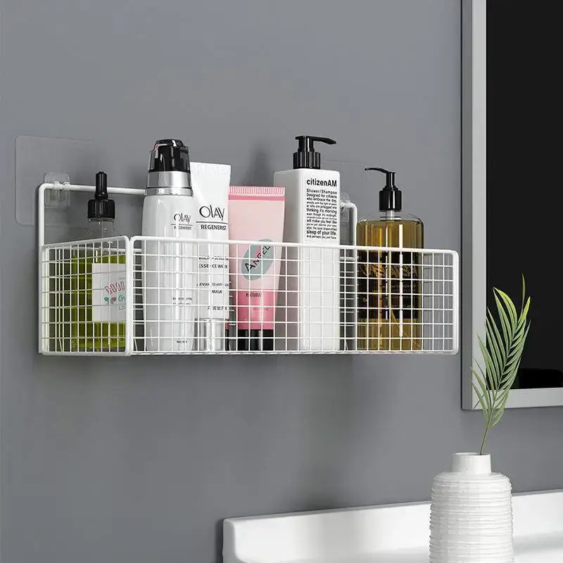 White wire mesh wall-mounted bathroom shelf holding bath essentials for efficient bathroom storage and organization