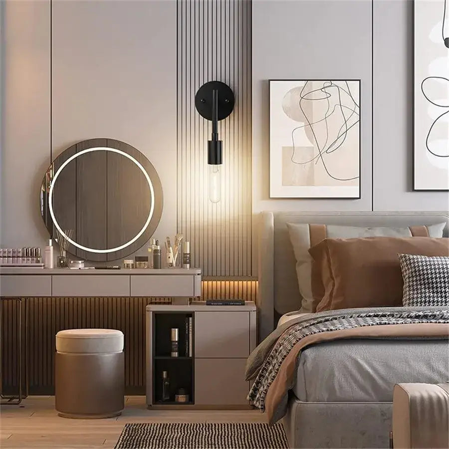 Circular vanity mirror with led ring and sleek decorbites black metal wall lamp for bathroom lighting