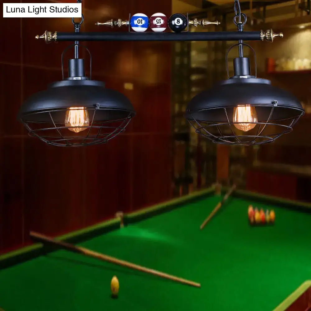 Black metal wire frame pool table light fixture with two dome shades and wire cages for billiard room lighting