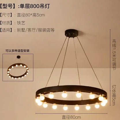Industrial black multi tier pendant light with black wrought iron circular design and warm white bulbs for staircase decorbites industrial duplex