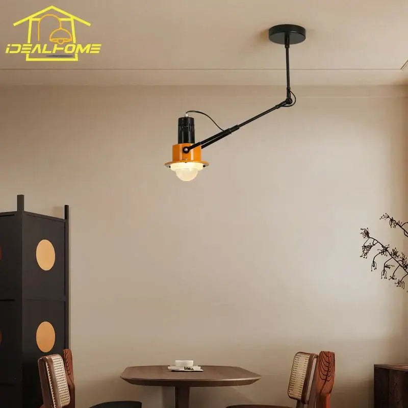 Industrial black and orange swing arm wall lamp with adjustable metal frame and frosted glass shade for bedroom decorbites industrial swing arm wall lamp