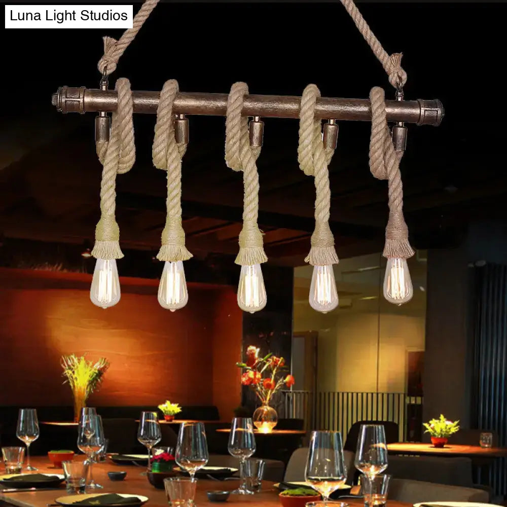 Industrial black pipe and rope chandelier with rustic metal frame and edison bulbs for linear restaurant island lighting