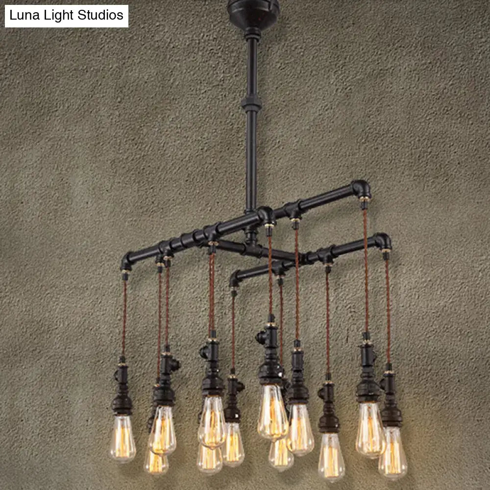 Industrial black pipe LED chandelier with exposed filament bulbs hanging from braided cords for dining room island lighting