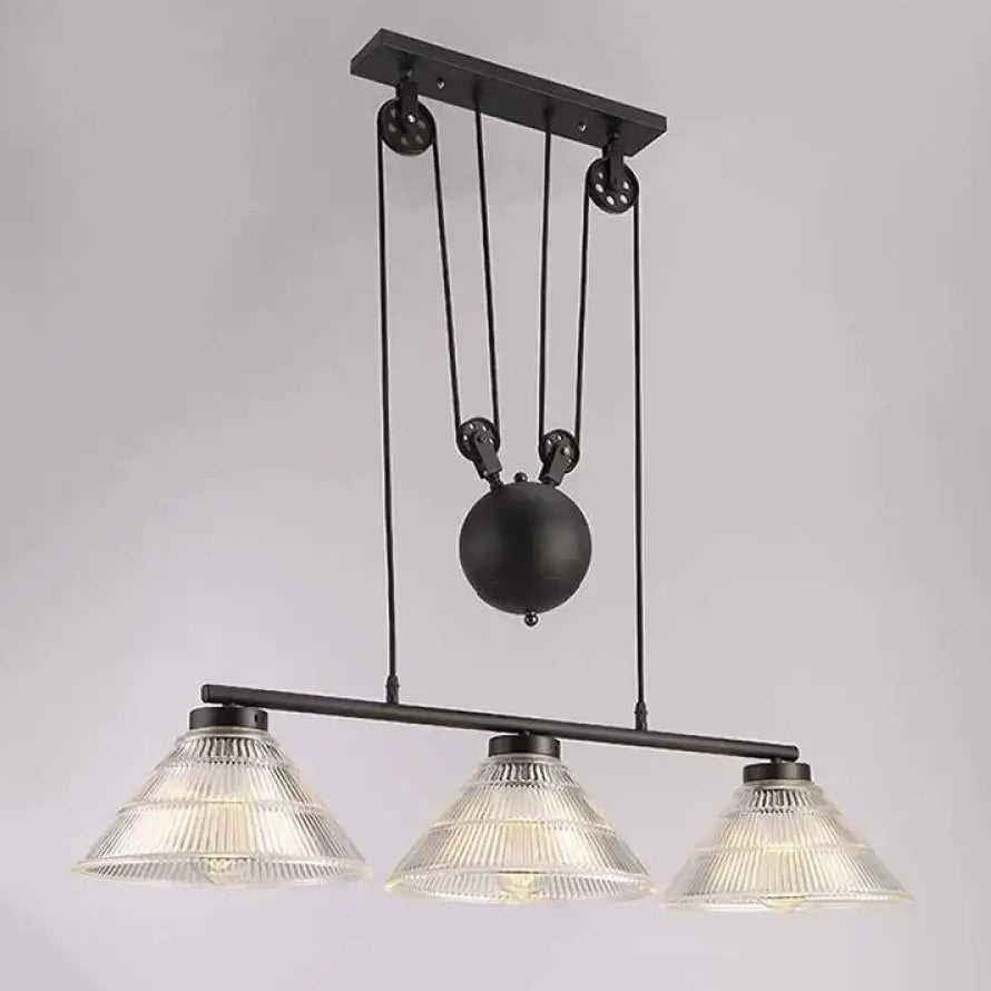 Decorbites™ industrial cone pendant island lamp in black metal with three prismatic glass shades and adjustable pulley
