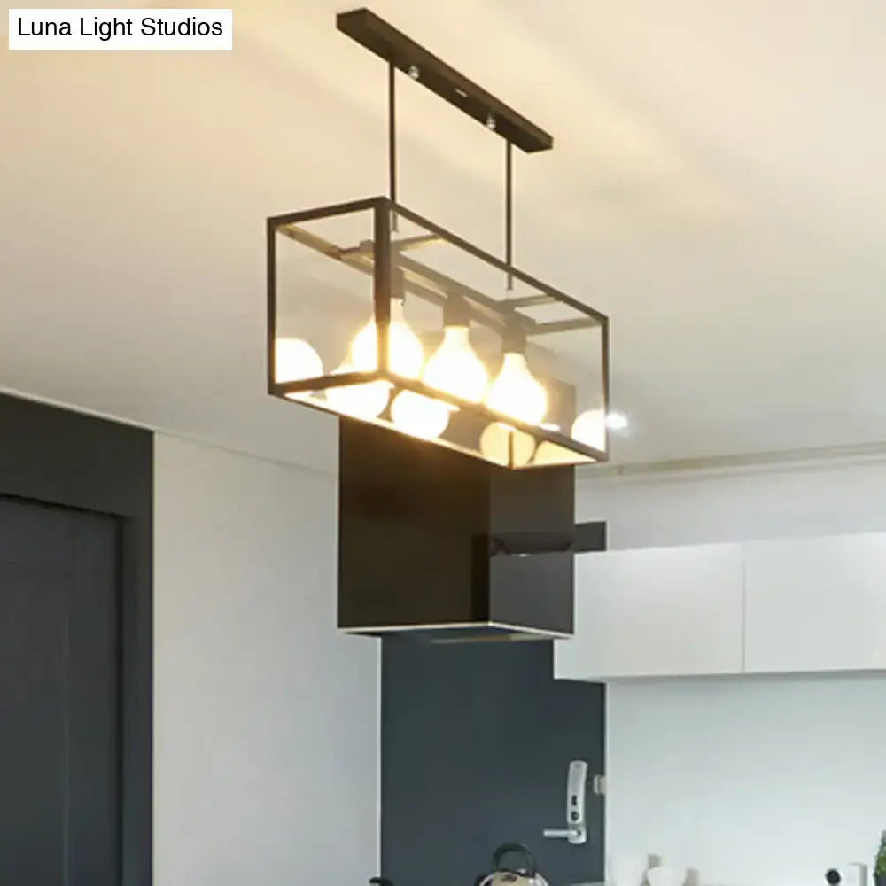 Black rectangular industrial kitchen island pendant light with clear glass panels and exposed bulb fixtures by decorbites