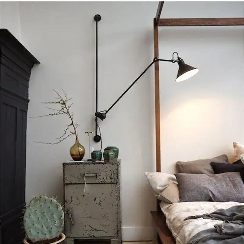 Black articulated wall lamp with matte finish and adjustable arm decorbites industrial iron swing for bedroom decor