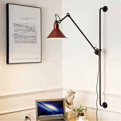 Industrial black and red swing arm wall lamp with matte black iron articulated arm and red metal shade for bedroom decorbites industrial iron swing