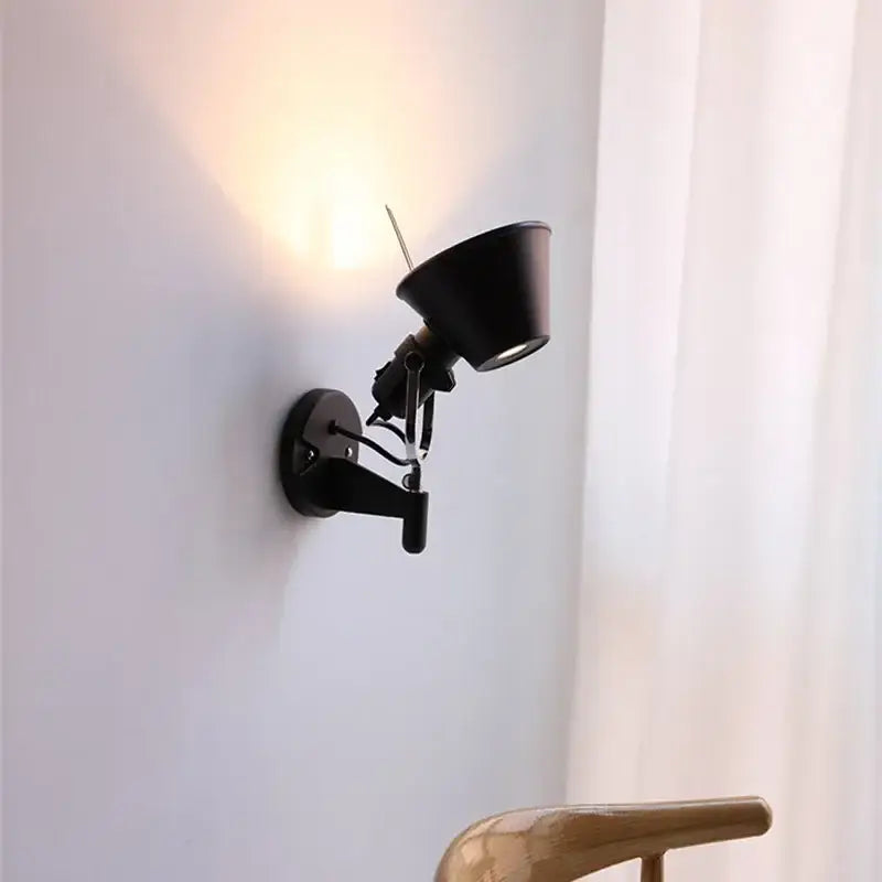 Industrial black silver swing arm wall lamp with matte finish and adjustable arm for bedroom reading decorbites industrial black