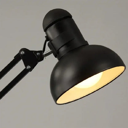 Industrial black spider iron chandelier pendant light with black matte metal desk lamp featuring curved articulated arm