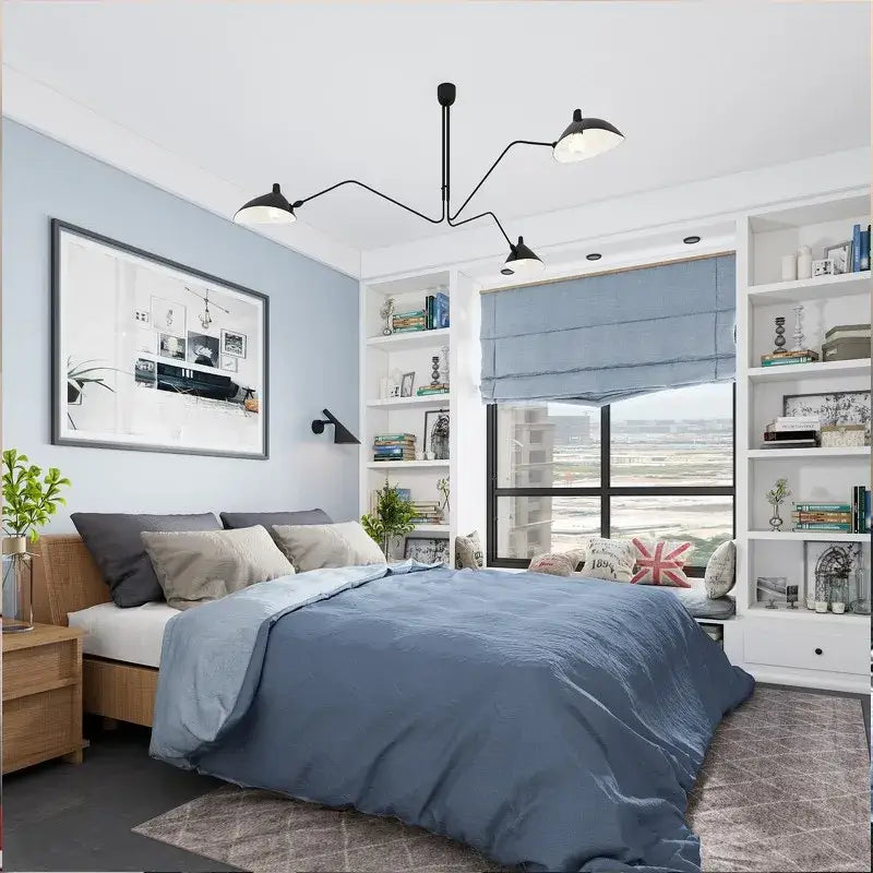 Industrial black swing arm chandelier with 5 lights shown over a blue duvet cover with soft textured fabric finish