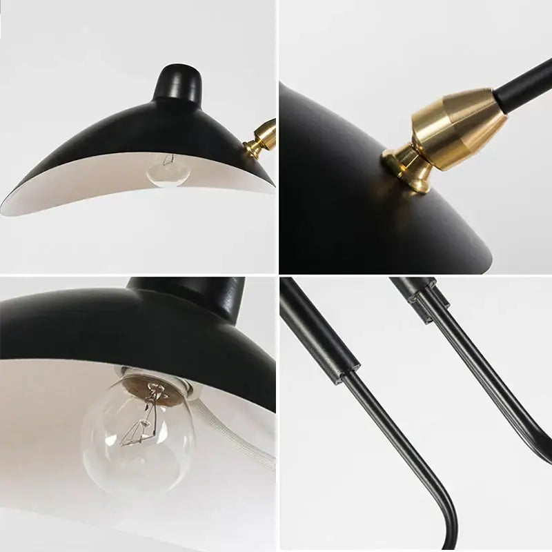 Industrial black swing arm chandelier with black conical lampshades brass accents and curved metal arms for dining room decorbites black swing