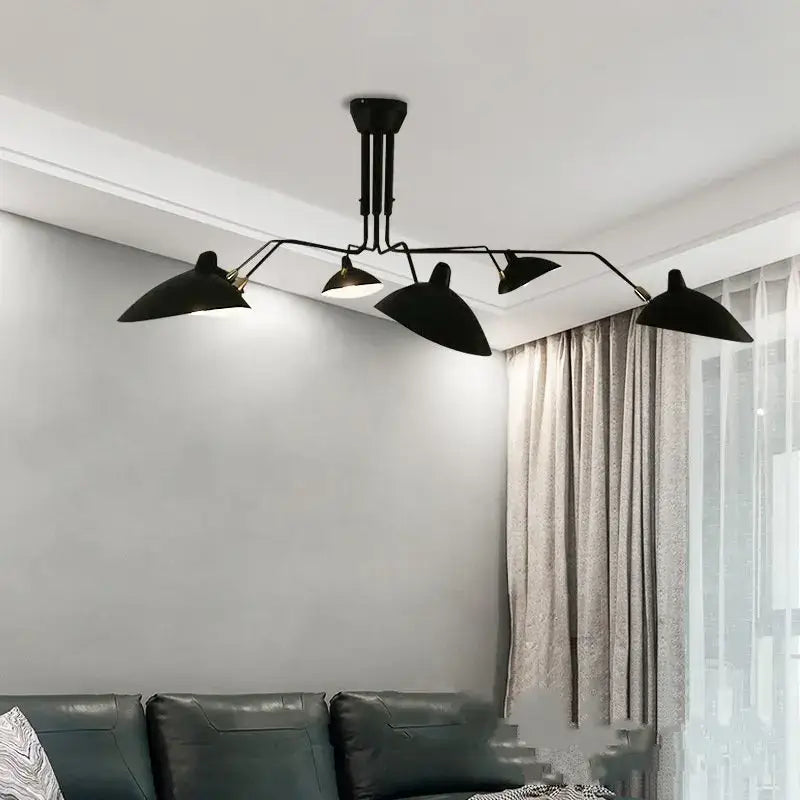 Industrial black swing arm chandelier with five angled dome-shaped metal lampshades for dining room decorbites black swing