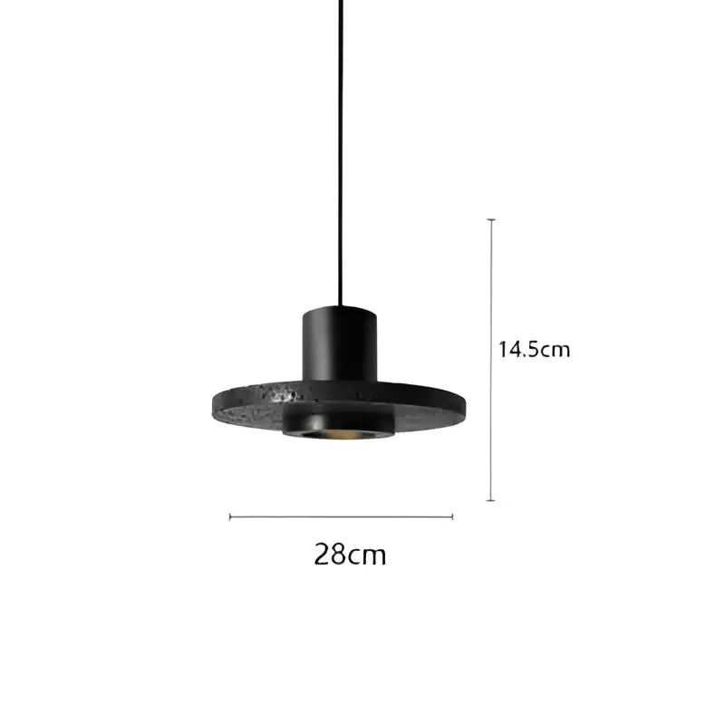 Industrial black travertine cement pendant light with textured circular disc shade and cylindrical stem for kitchen decorbites