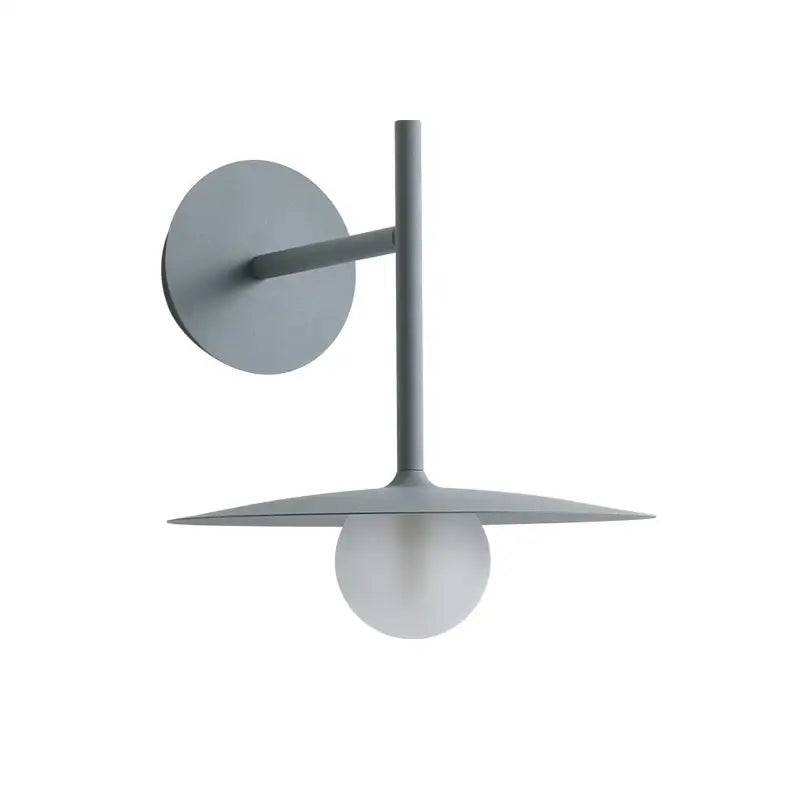 Modern gray wall lamp with minimalist disc sconce and opaque bulb in decorbites industrial style wall design