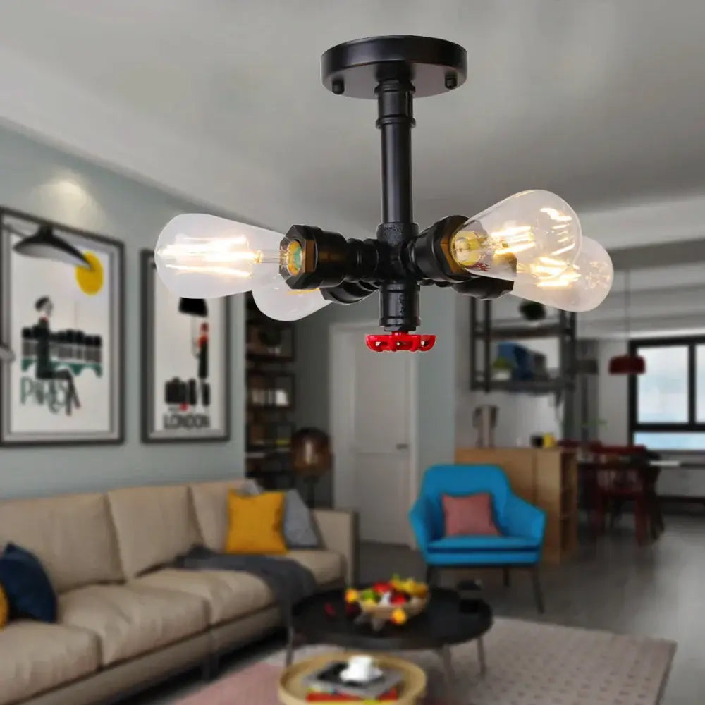 Industrial black water pipe wall lamp with three filament bulbs and red valve accent for bedroom decorbites industrial water decor