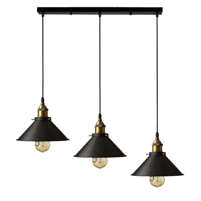 Industrial black and white ceiling chandelier with black metal pendant lights brass accents and exposed filament bulbs