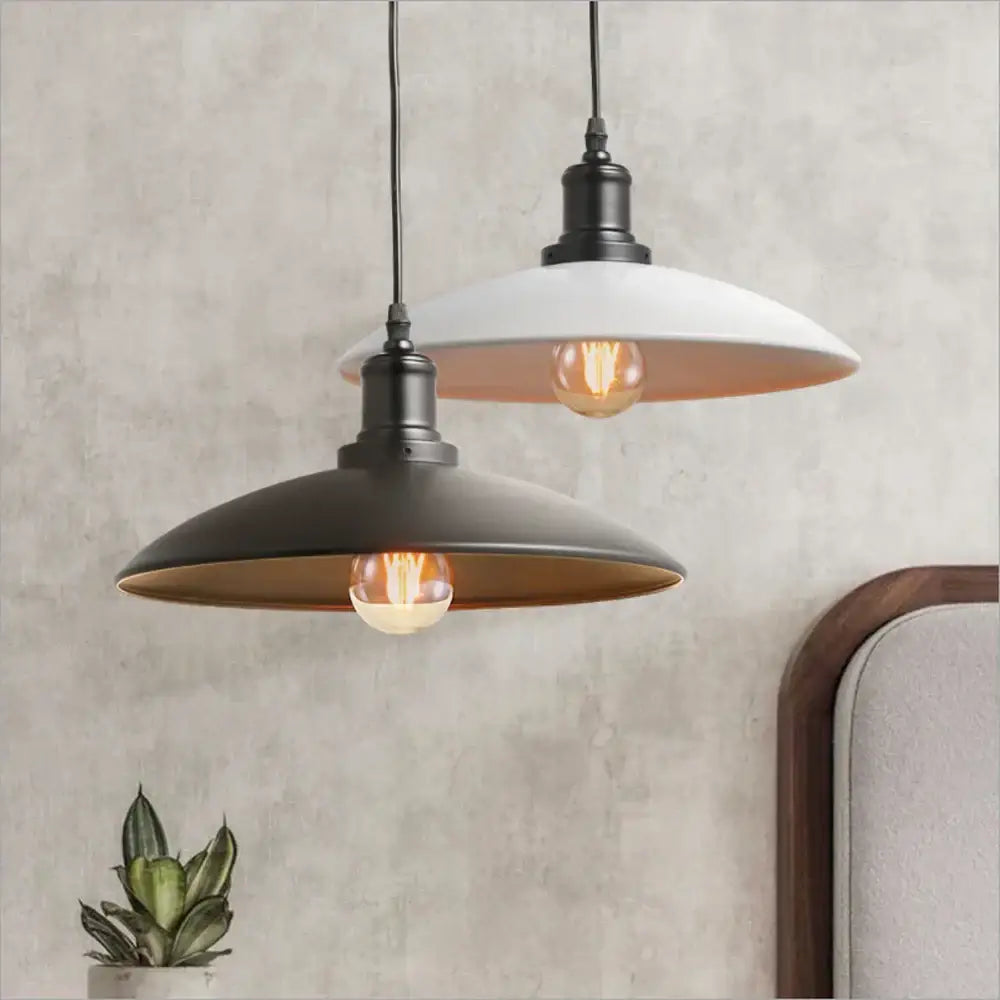 Industrial black white and copper iron pendant light featuring two matte black decorbites iron pendant shades with edison bulbs