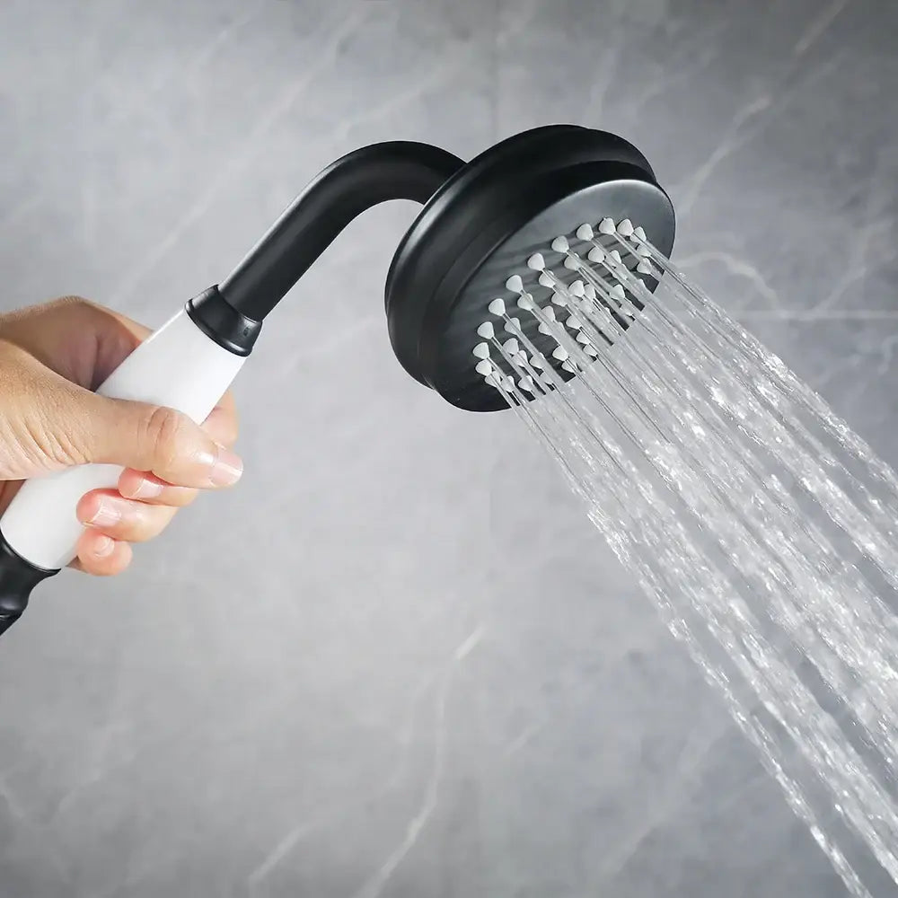 Black and white handheld shower faucet with curved dual handle and multiple water jets by decorbites industrial black