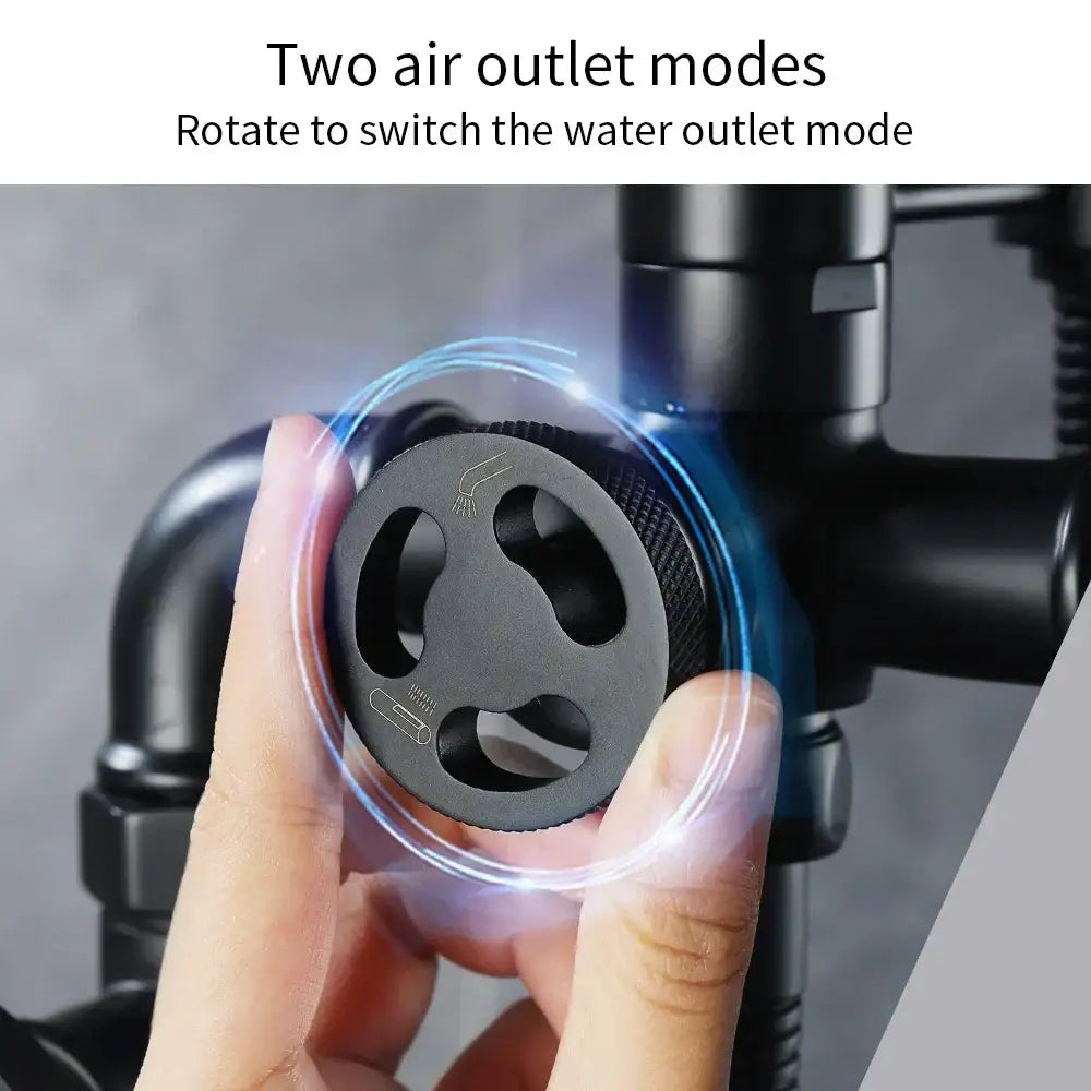 Black textured rotary knob with three air outlet slots for switching water flow on decorbites industrial black dual handle shower faucet