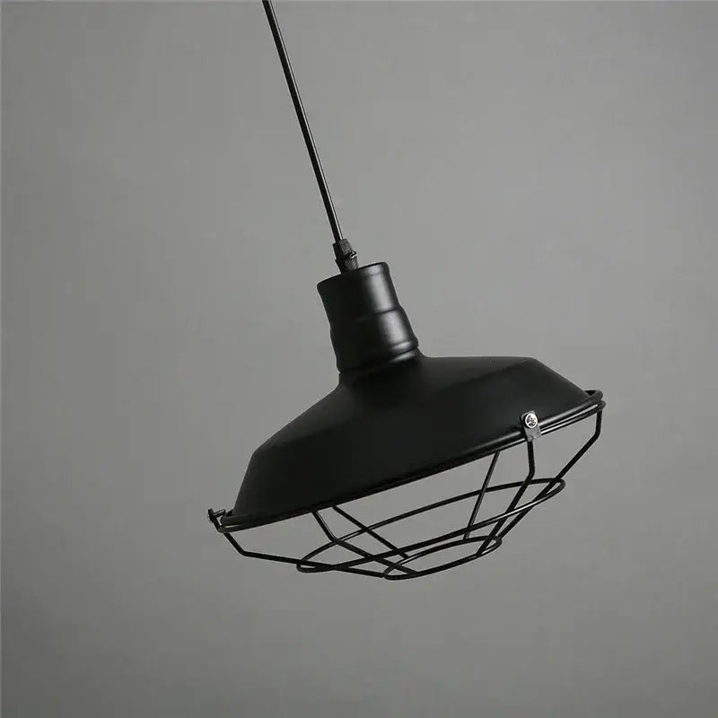Black industrial-style iron pendant light with metal cage design for kitchen decorbites iron pendant lights collection