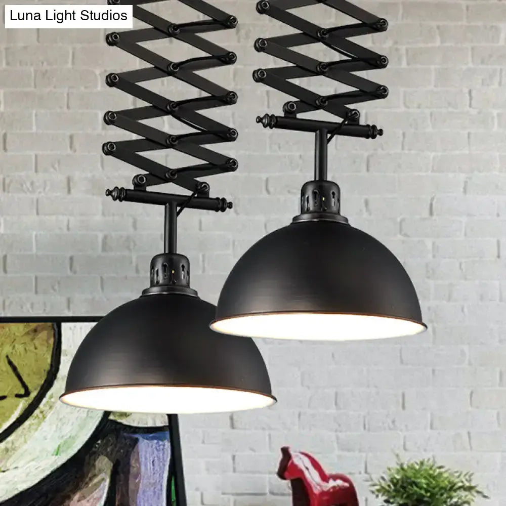 Black industrial-style decorbites pendant light with extendable accordion arms and matte dome shades in black white finish