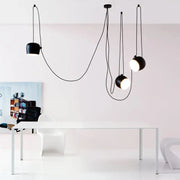 Industrial black white spherical pendant light with flexible cords hanging from ceiling for dining room decorbites industrial black