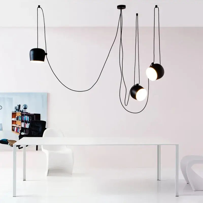Industrial black white spherical pendant light with flexible cords hanging from ceiling for dining room decorbites industrial black