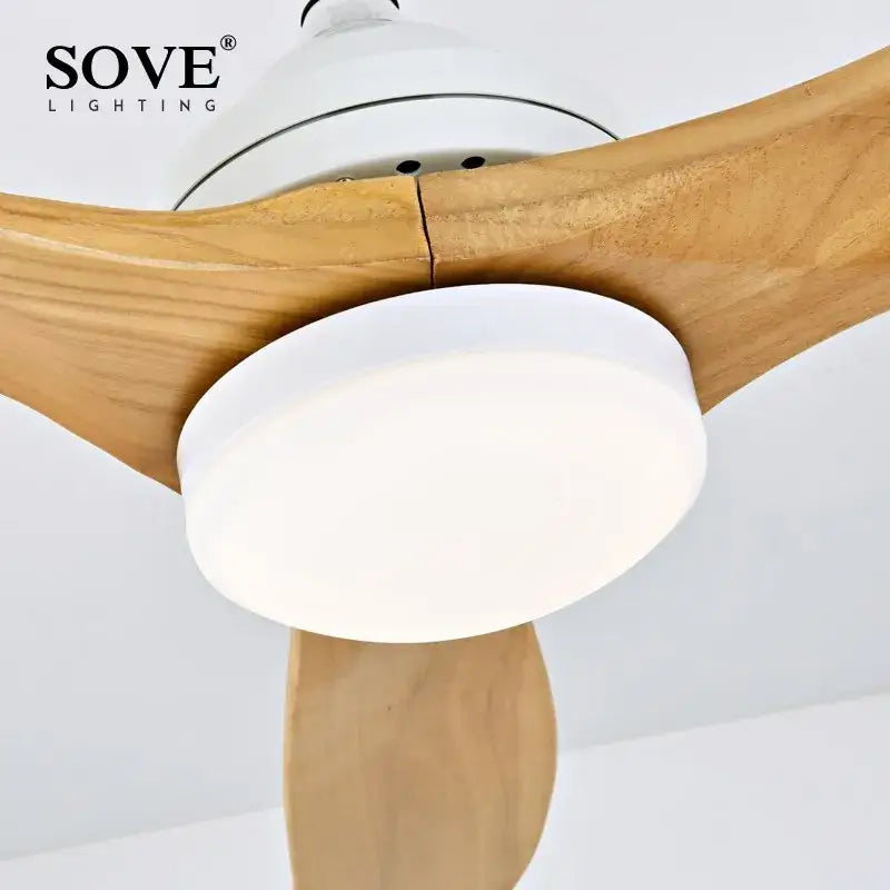 White circular led light fixture integrated into black wood ceiling fan blade assembly decorbites black wood design