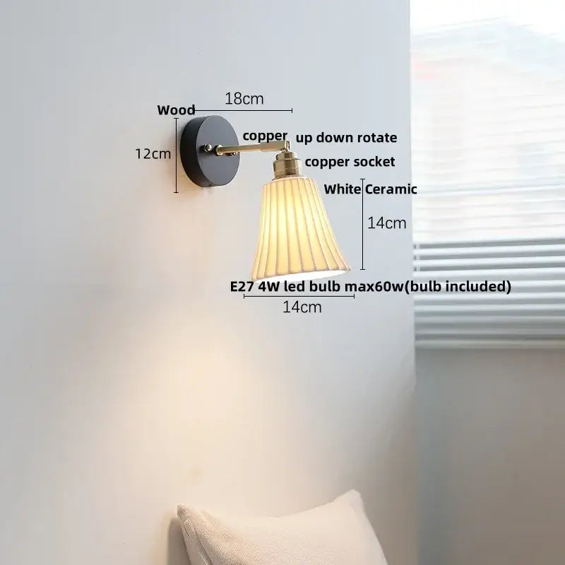 Industrial black wood led wall sconce with brass accent featuring a black wooden base, copper arm, and white pleated shade