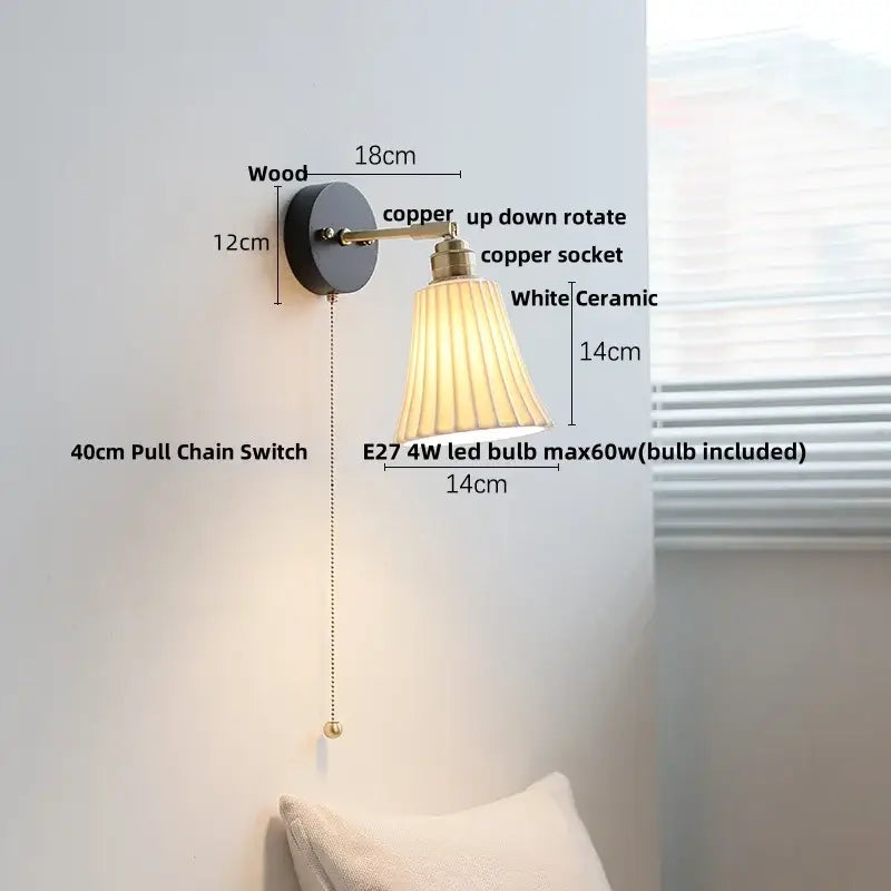 Industrial black wood led wall sconce with brass accent featuring a dark wood base copper arms and white pleated ceramic shade