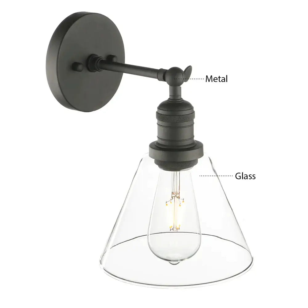 Industrial black wrought iron wall lamp with clear glass shade and exposed filament bulb for bedroom use