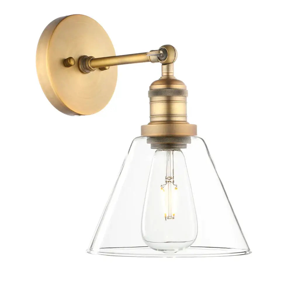 Industrial black wrought iron wall lamp with brass finish clear glass shade and exposed filament bulb for bedroom use