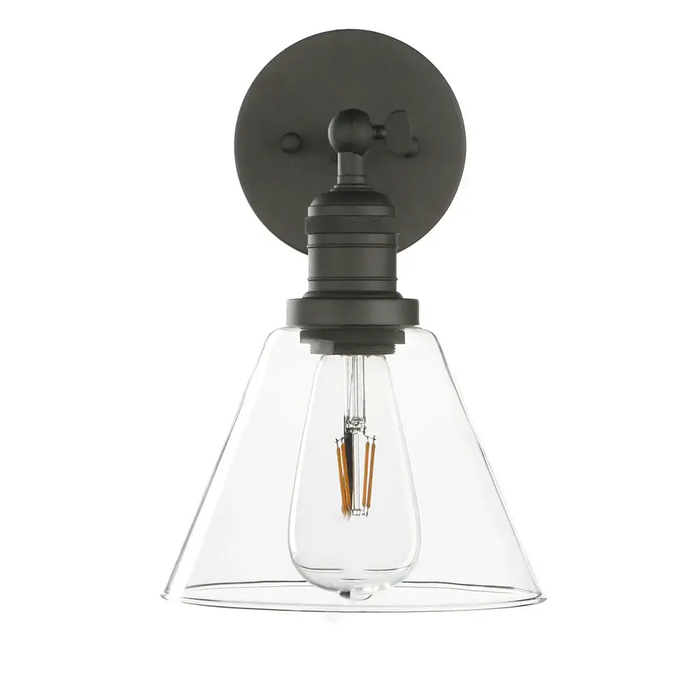 Black metal wall lamp with clear glass shade and exposed filament bulb ideal for industrial bedroom lighting