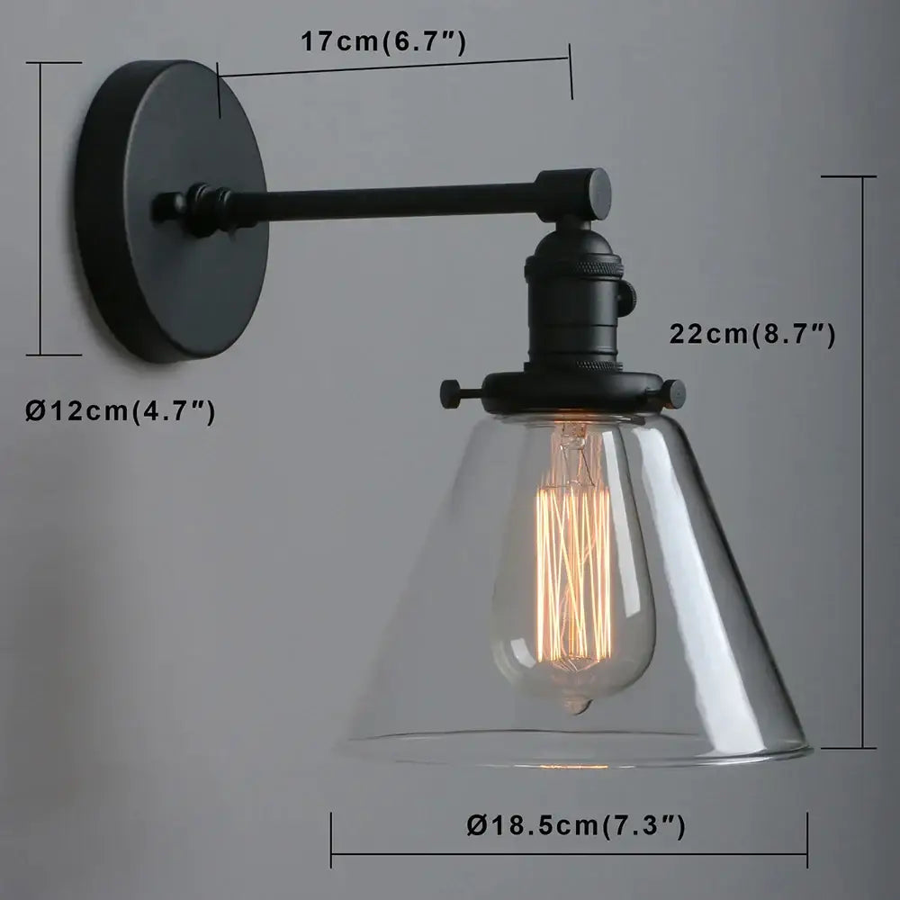 Industrial black wrought iron wall sconce with clear glass cone canopy and exposed filament bulb for kitchen decorbites cone canopy wall