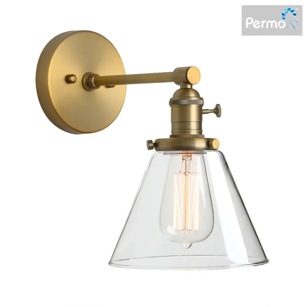 Brass-finished wall sconce with clear glass conical shade and exposed filament bulb for industrial decorbites cone canopy wall