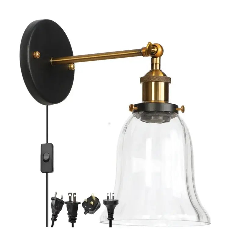 Industrial brass and clear glass wall sconce with black base and bell-shaped shade for bedroom decorbites industrial clear
