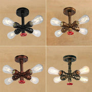 Industrial brass ceiling chandelier with four clear glass bulbs and dark copper finish for dining room decorbites industrial brass