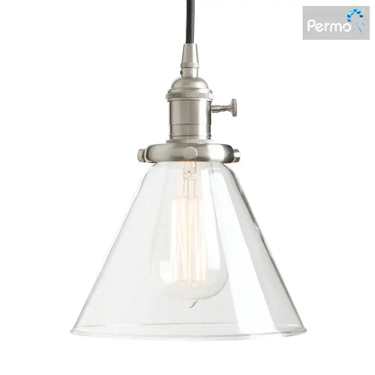 Clear glass bell-shaped pendant light with brushed nickel fixture and exposed edison bulb for decorbites funnel flared glass decor
