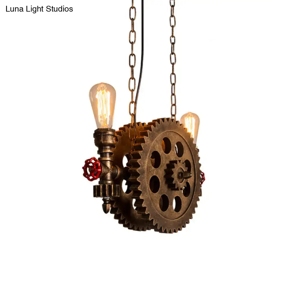 DecorBites antique gear pendant light with brass gears, exposed Edison bulbs, and red valve accents for dining room