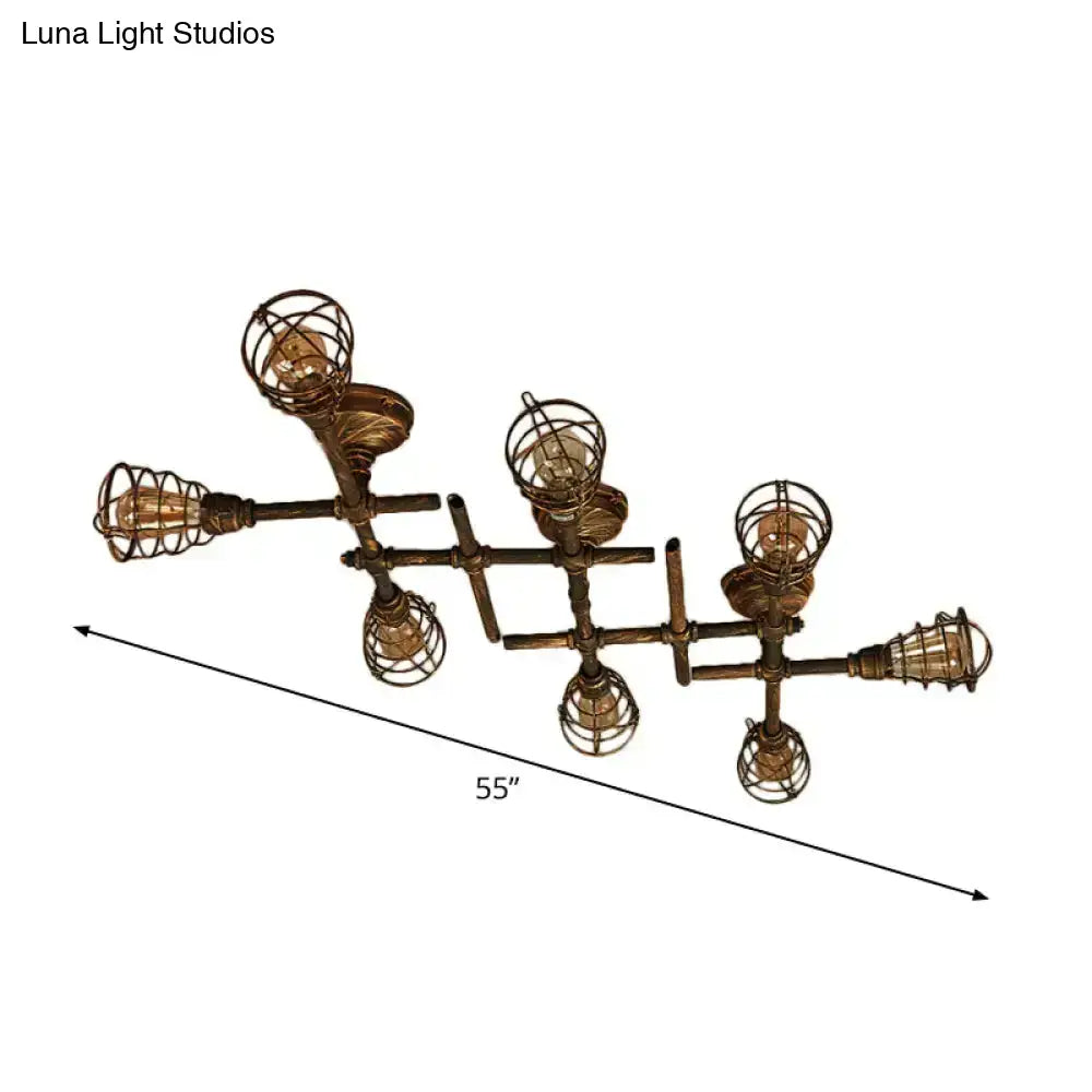 Industrial brass intersecting piping ceiling light with six exposed filament bulbs in wire cages for dining room