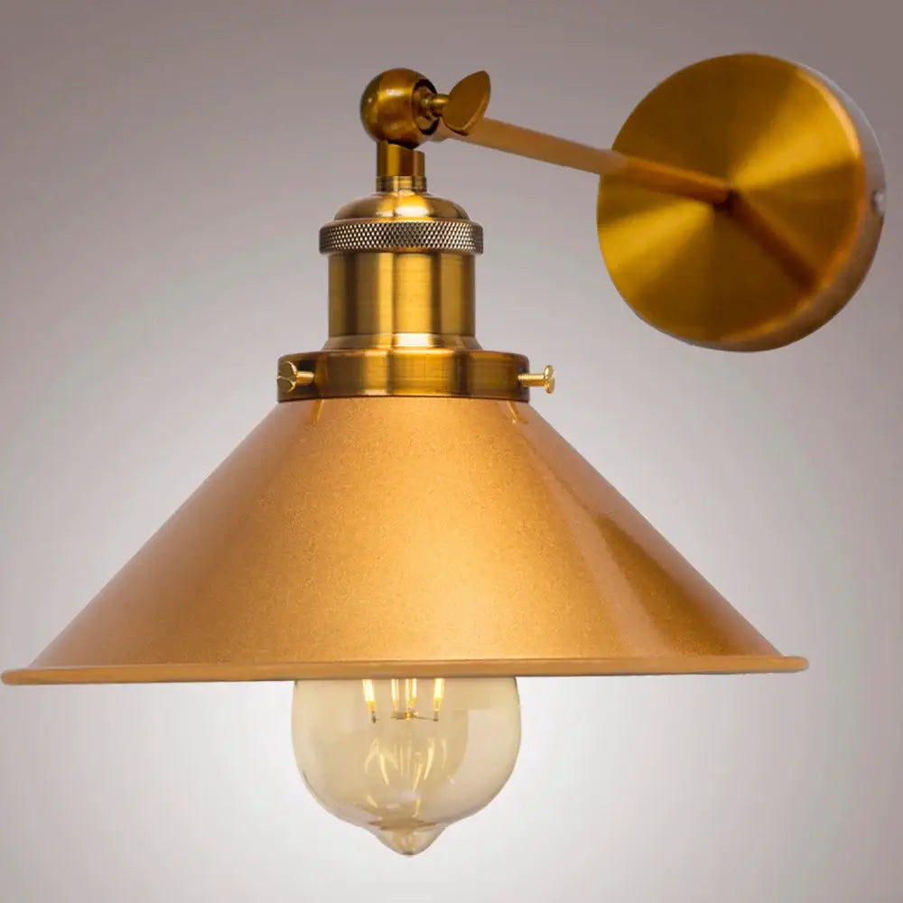 Brass-finished industrial led wall lamp with conical shade and exposed edison bulb for bedroom lighting